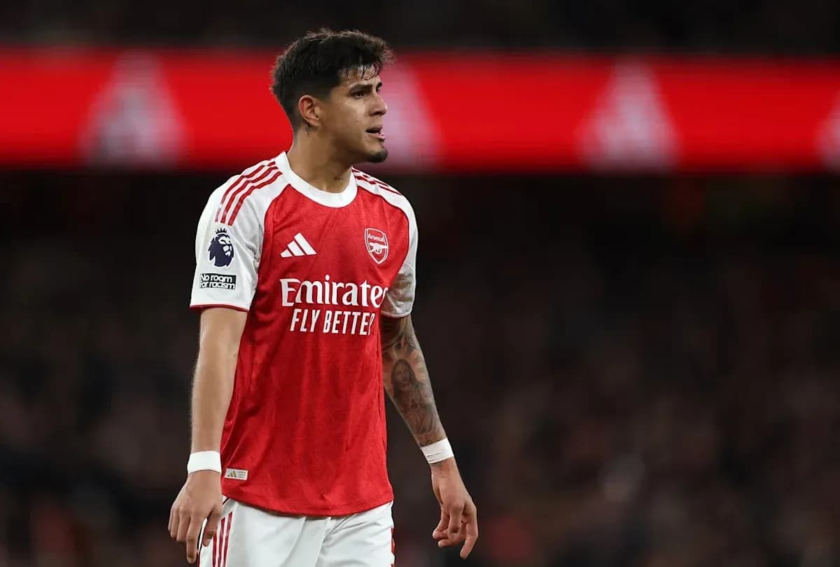 Arsenal player in red jersey during match