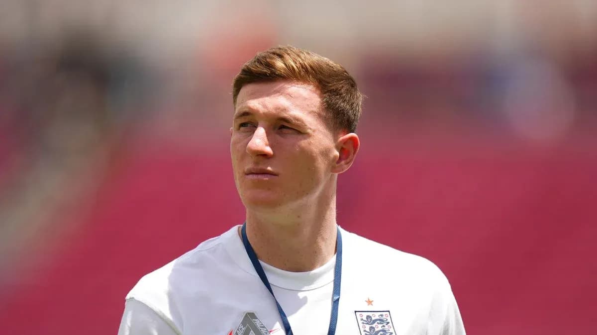 Player wearing England kit on the field