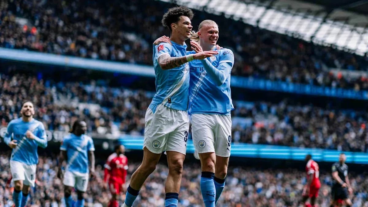 Manchester City players celebrating a goal in match
