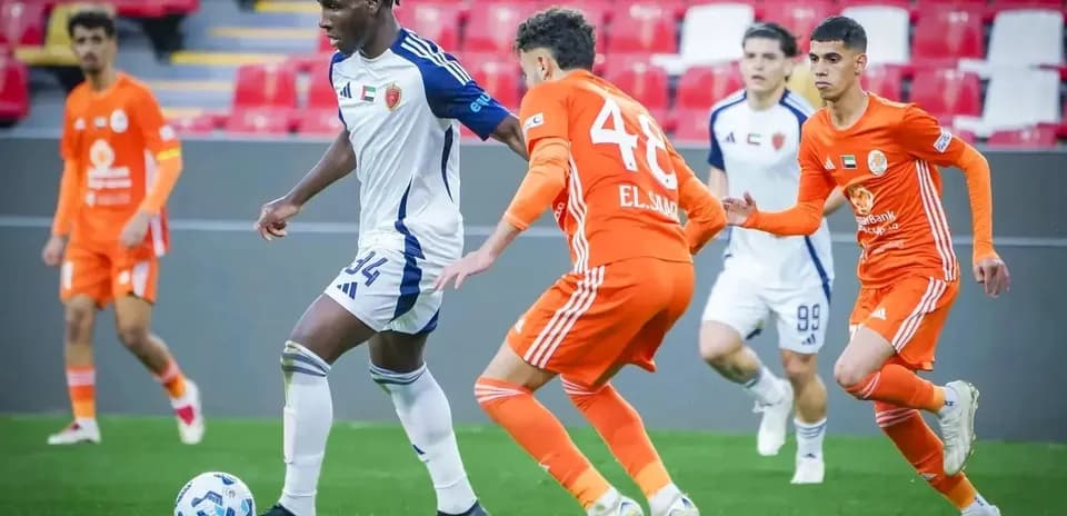 Players competing in U23 football match