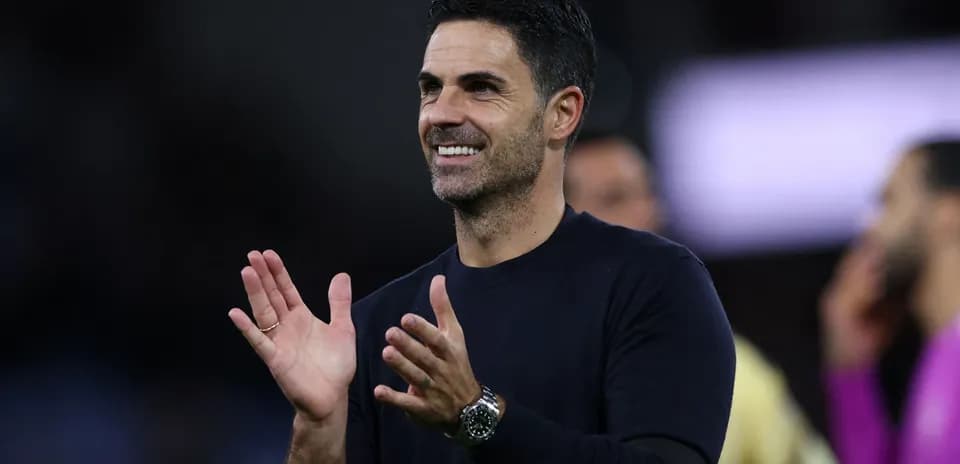 Coach applauding during a match