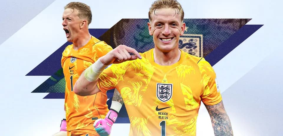 Goalkeeper celebrating in vibrant orange kit