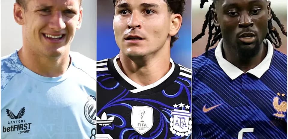 Three football players in their team jerseys