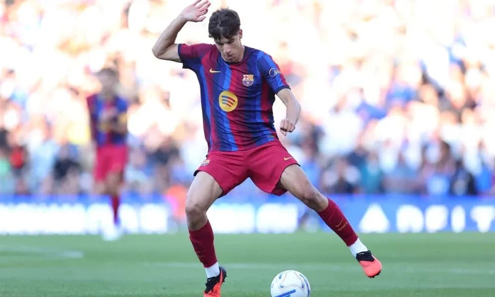 Player dribbling the ball on the pitch