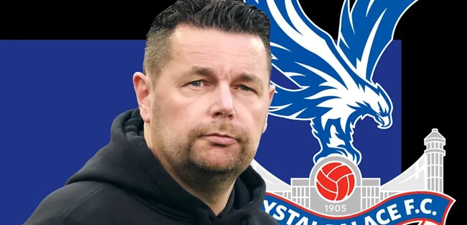 Man in hoodie with Crystal Palace FC logo background