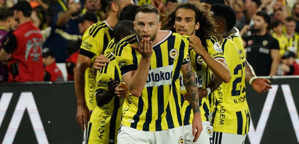 Fenerbahçe players celebrating a goal together