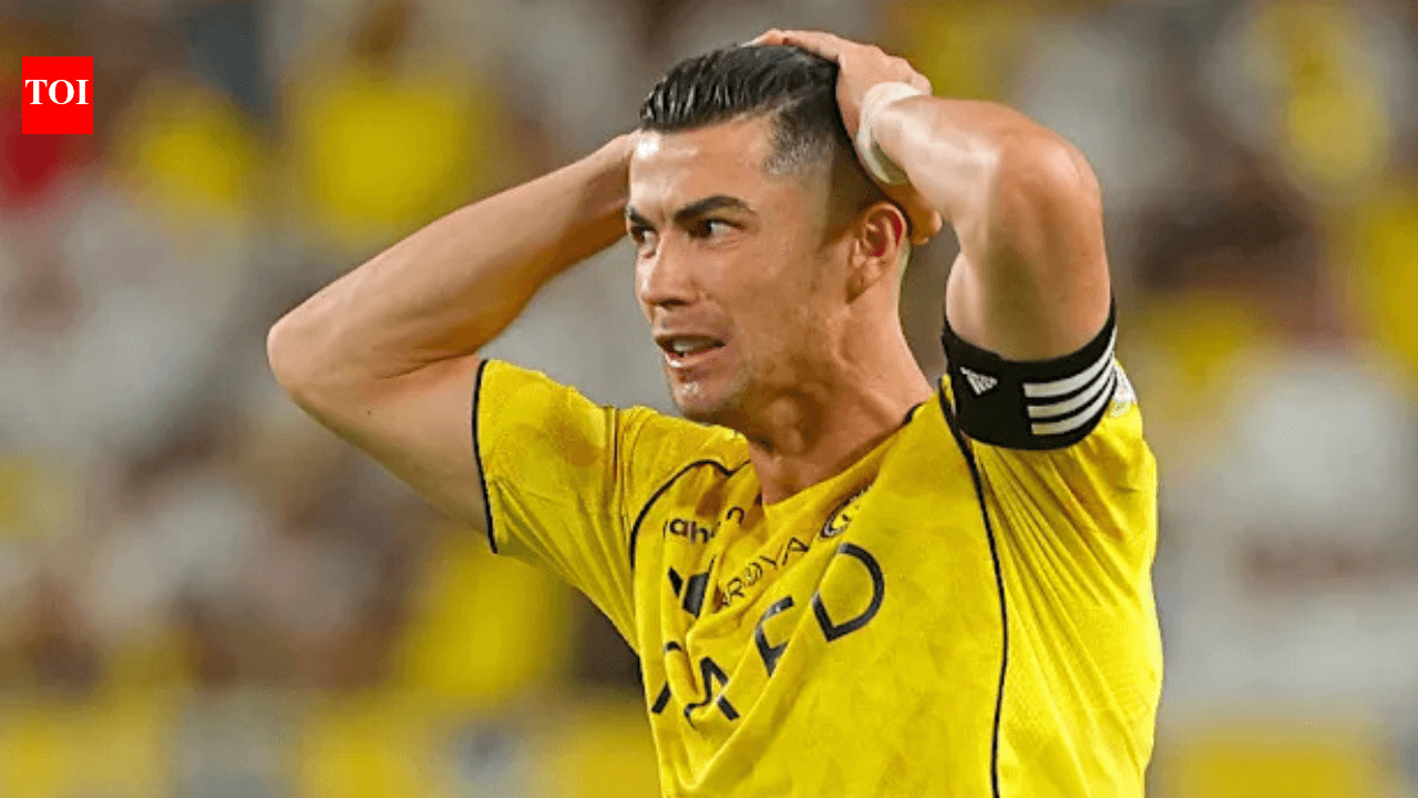 Player in yellow jersey reacting during match