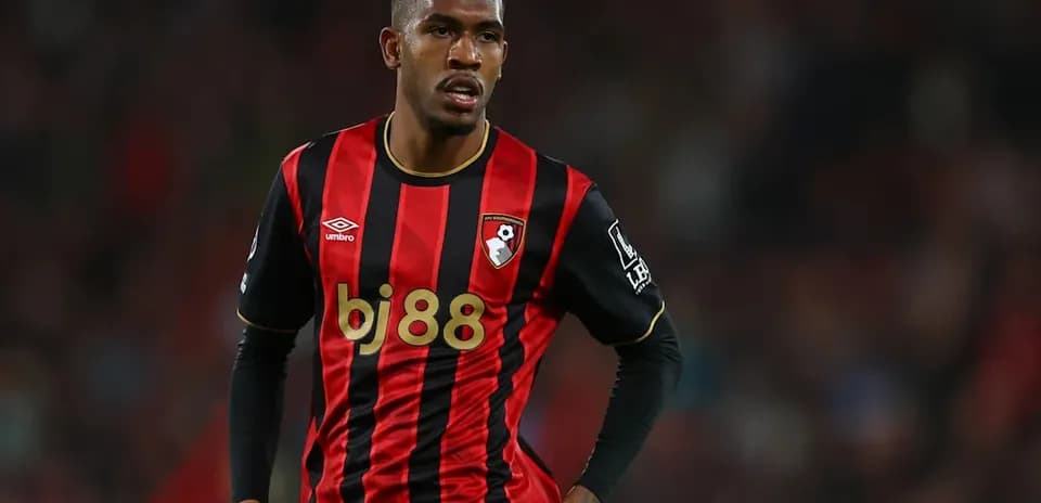 Bournemouth player in black and red striped jersey