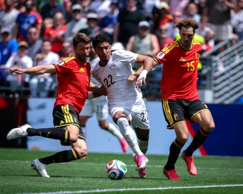 Players competing for the ball during match action