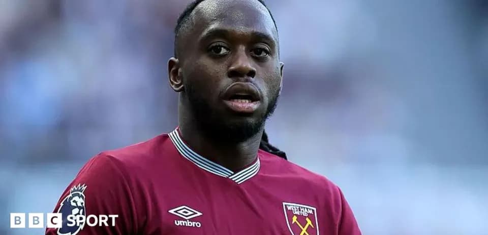 West Ham United player in maroon kit on pitch