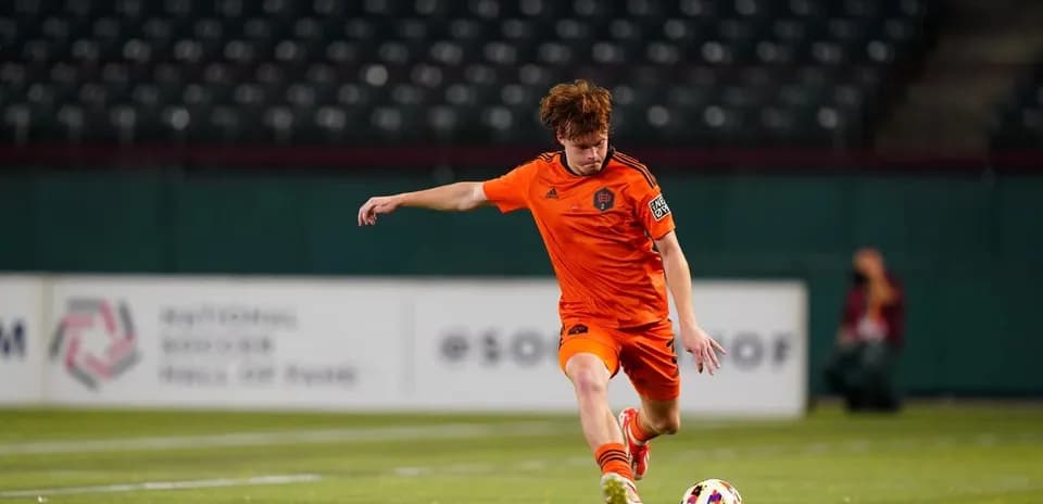Player kicking ball during Ventura County match