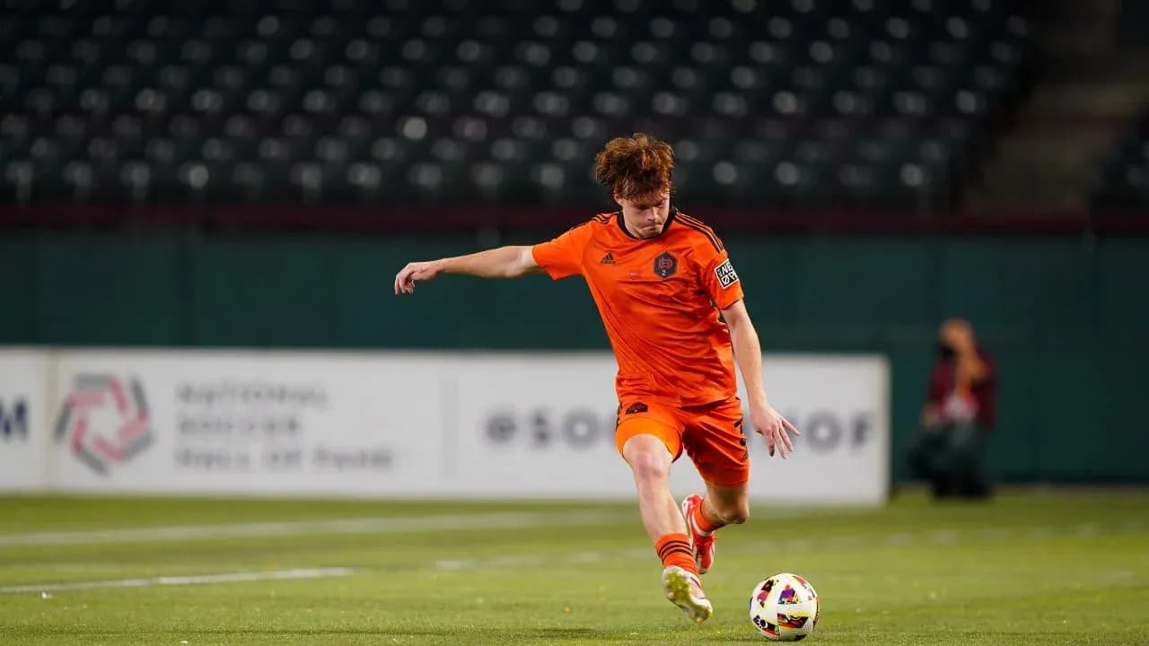 Player kicking ball during Ventura County match