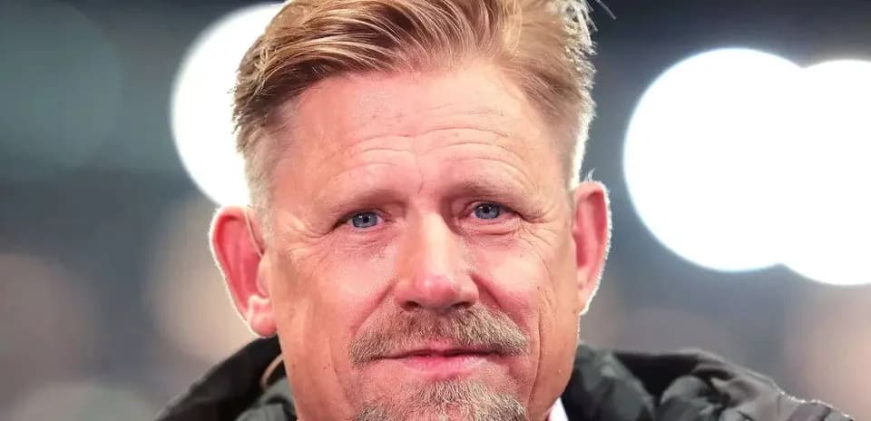 Man with short blonde hair and beard