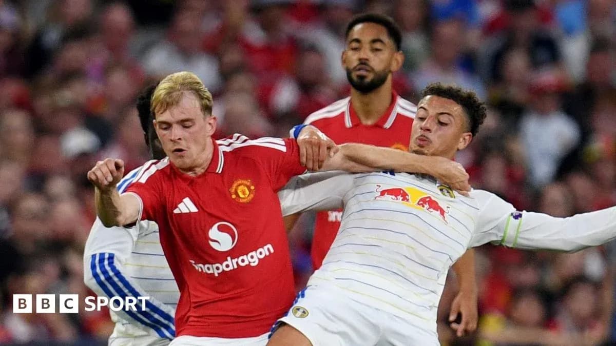 Manchester United player tackles Leeds United opponent