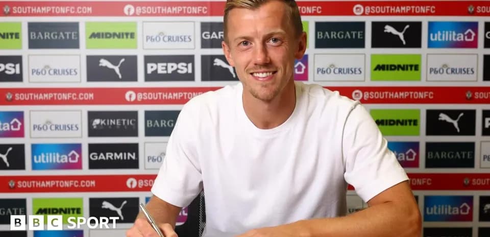 Player signing contract at Southampton FC press conference