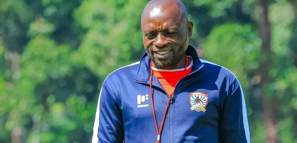 Coach smiling during training session outdoors