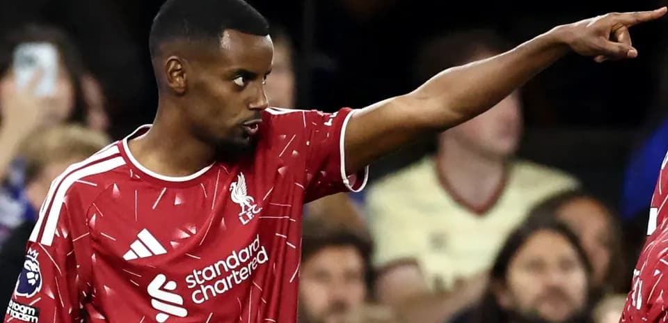 Player gesturing during Liverpool match on field