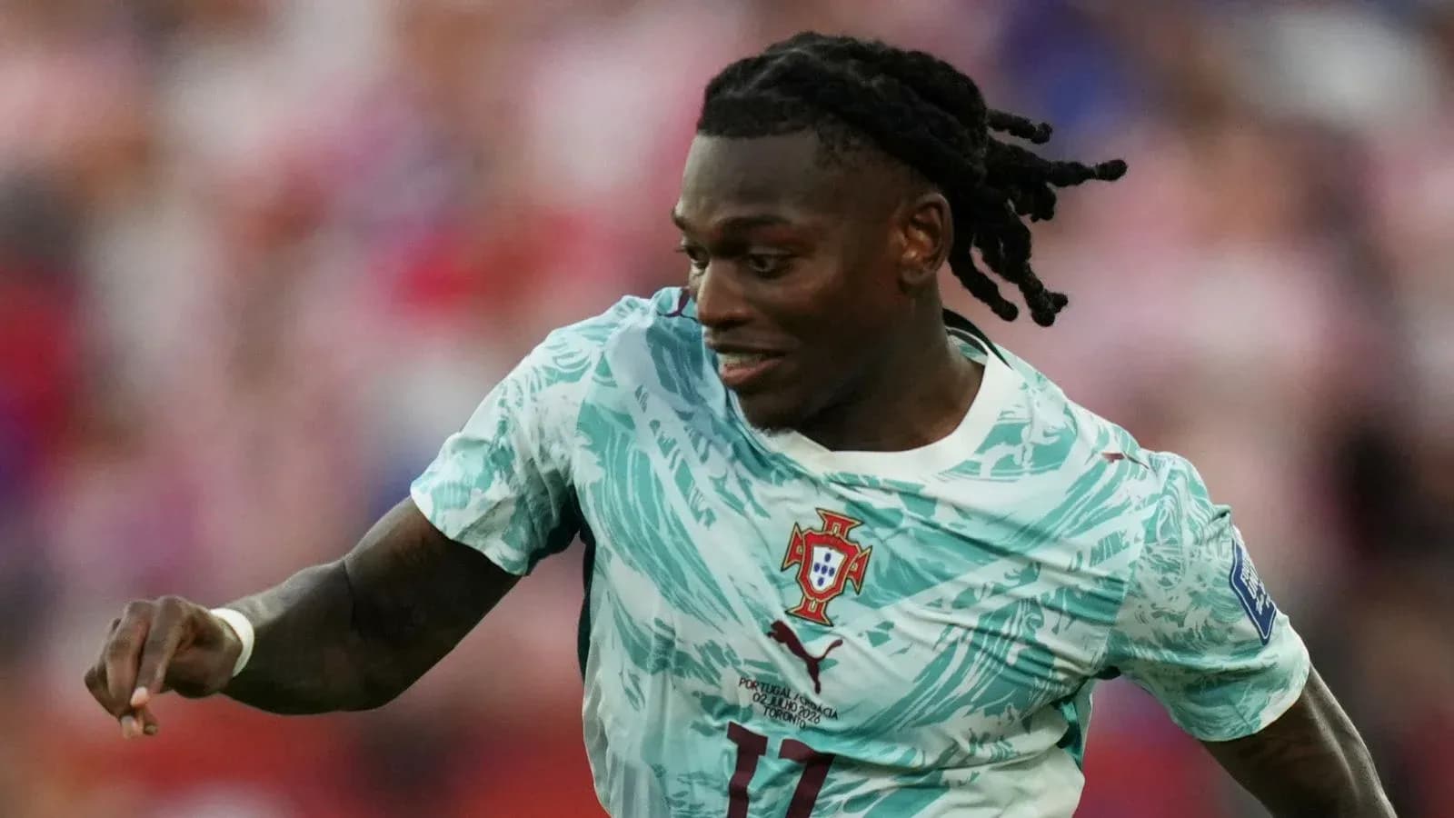 Player in Portugal jersey running during a match