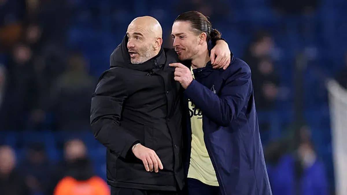 Coach and player celebrating after a match