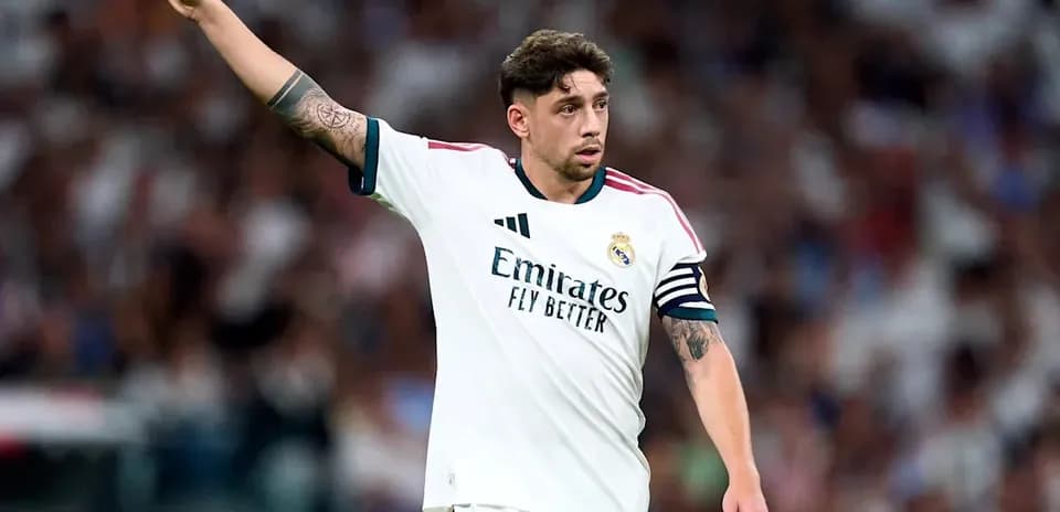 Player gesturing during a match for Real Madrid