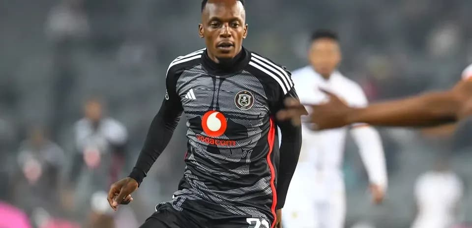 Player in black jersey during football match