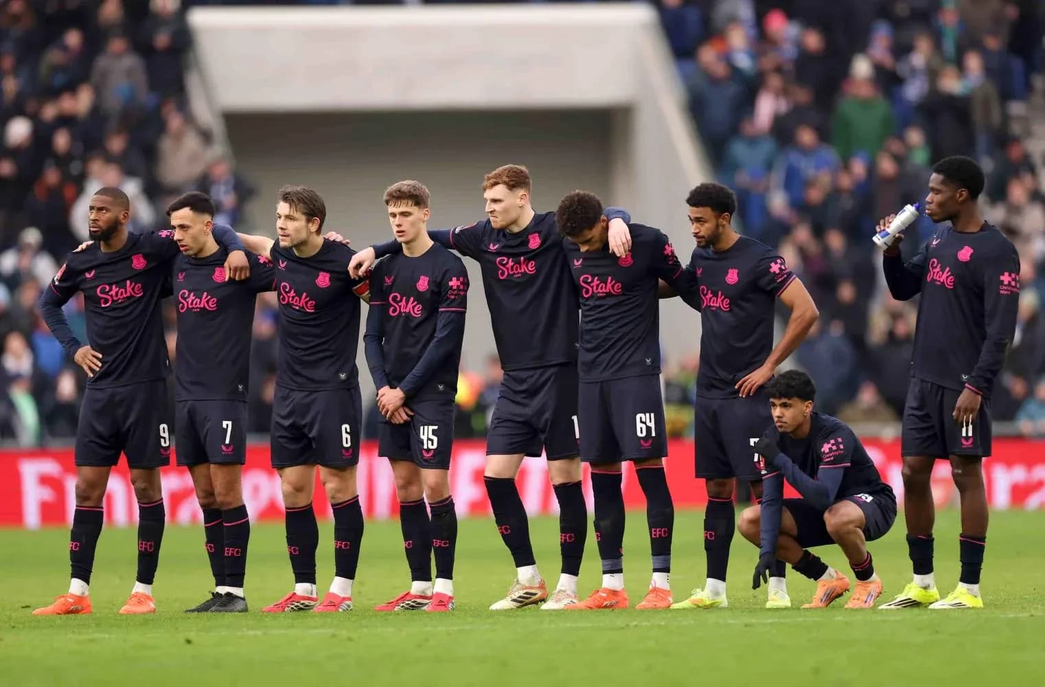 Everton players lined up during match preparation