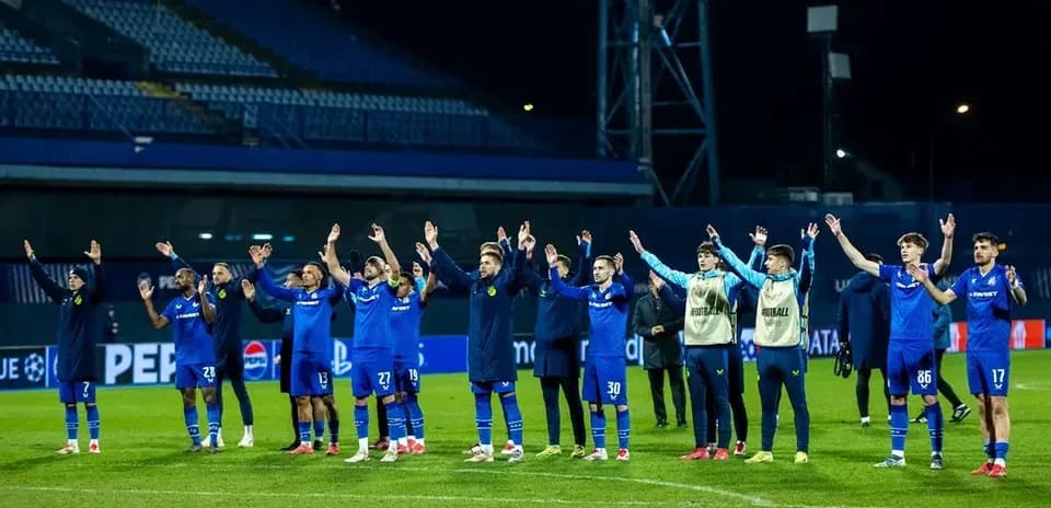 Dinamo Zagreb players celebrating victory on pitch
