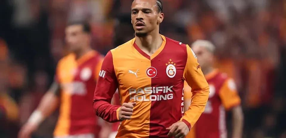 Player in Galatasaray jersey running on the field