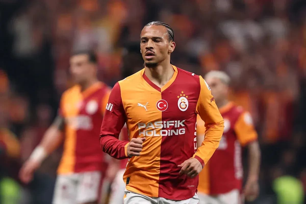 Player in Galatasaray jersey running on the field