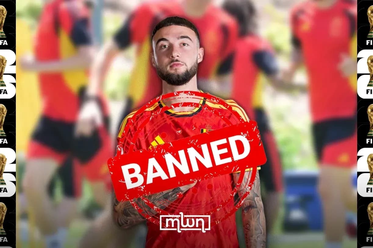 Player in Spain kit with 'BANNED' overlay