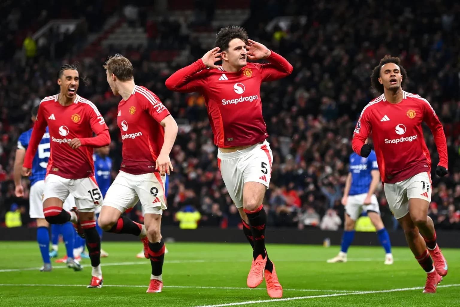 Manchester United players celebrating a goal