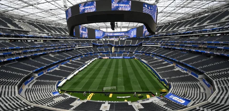 Empty stadium interior with soccer field view