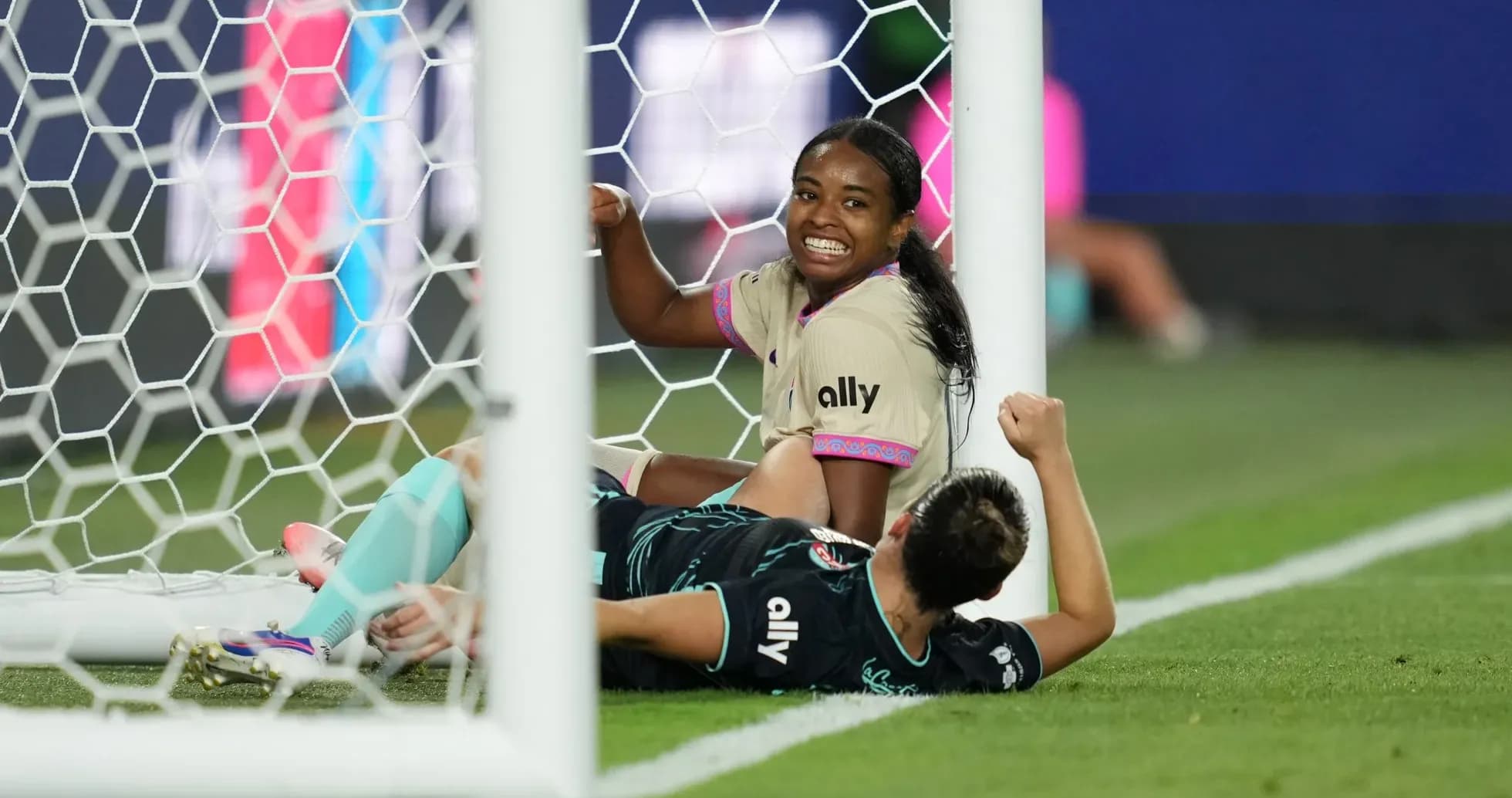 Players reacting during NWSL match