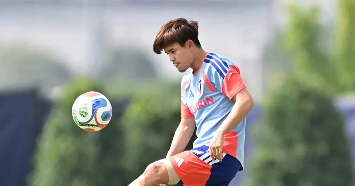 Player kicking a soccer ball during practice session