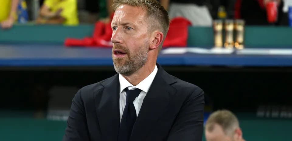Coach observing match from the sidelines