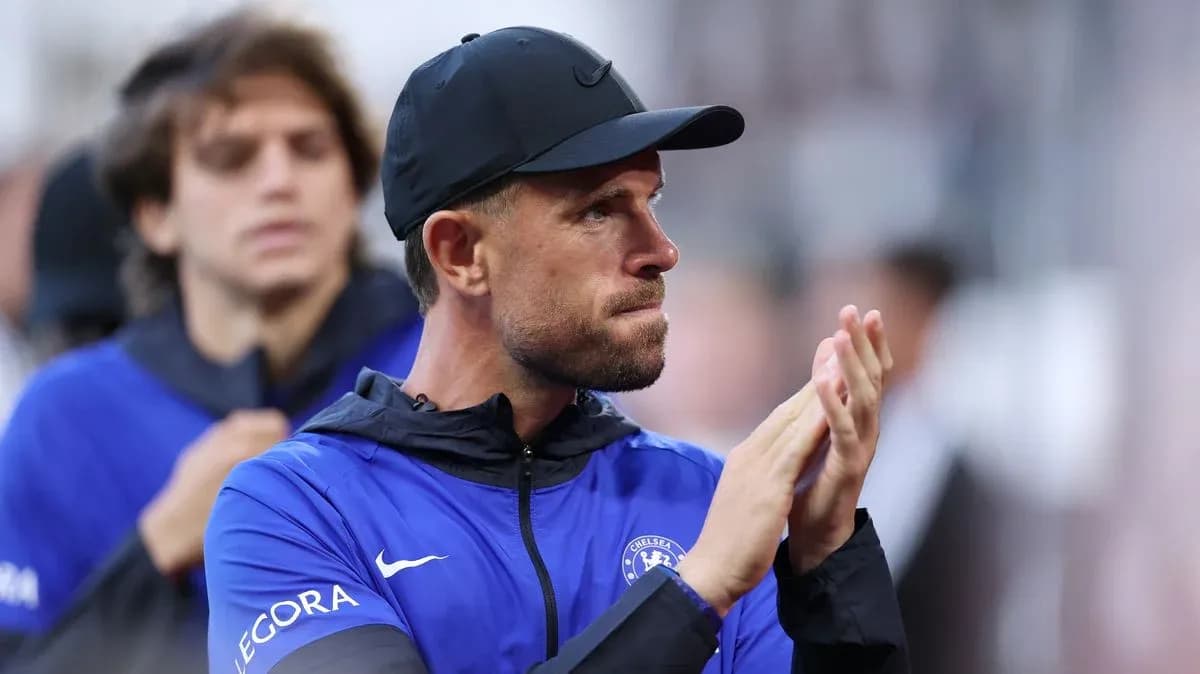 Coach applauding during match on the sidelines