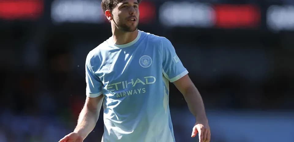 Player in light blue jersey during match action