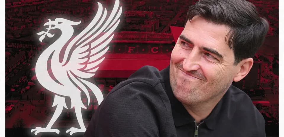 Person smiling with Liverpool FC logo background