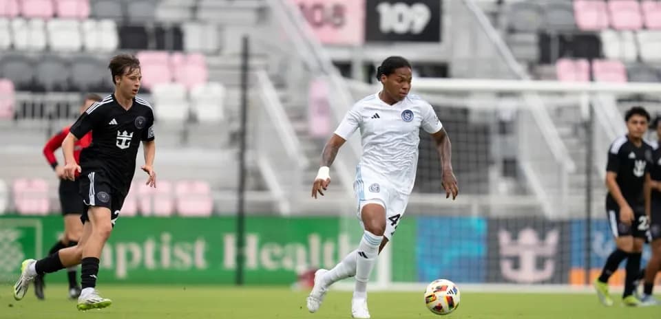 Player dribbling the ball during MLS Next Pro match