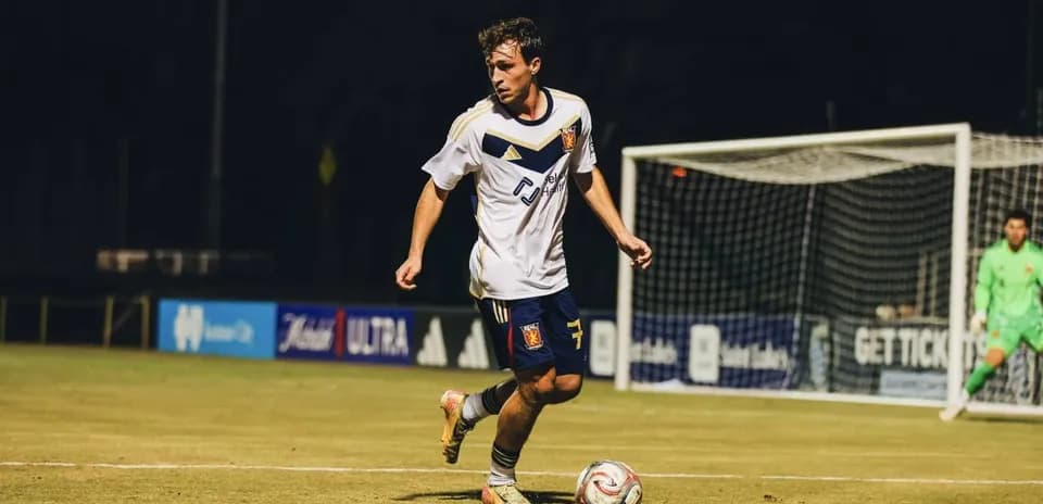 Player dribbling the ball during match