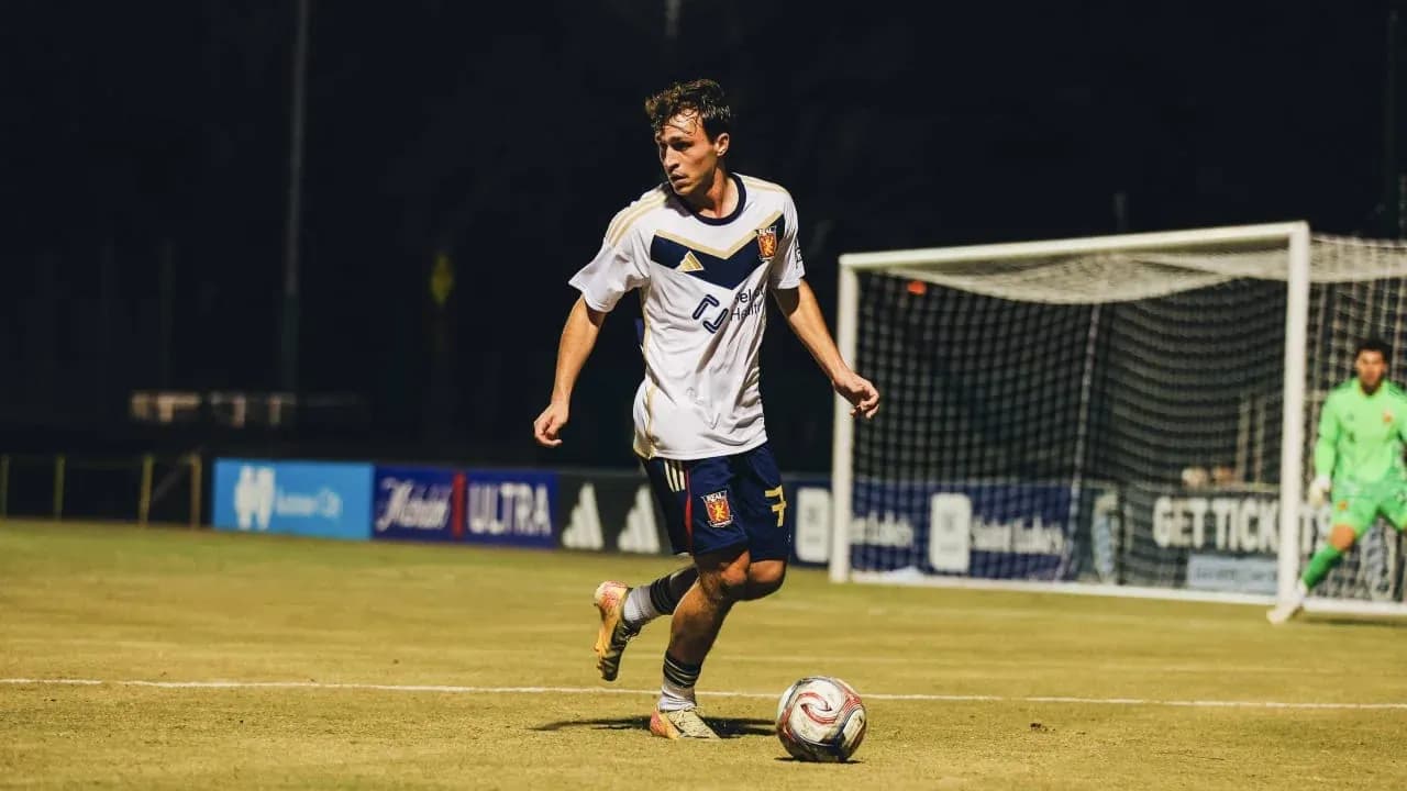 Player dribbling the ball during match