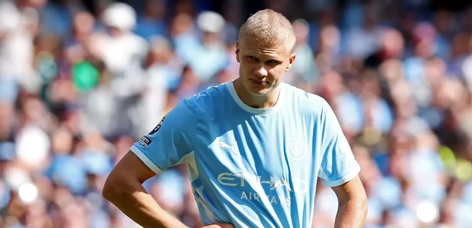 Player in light blue jersey during match