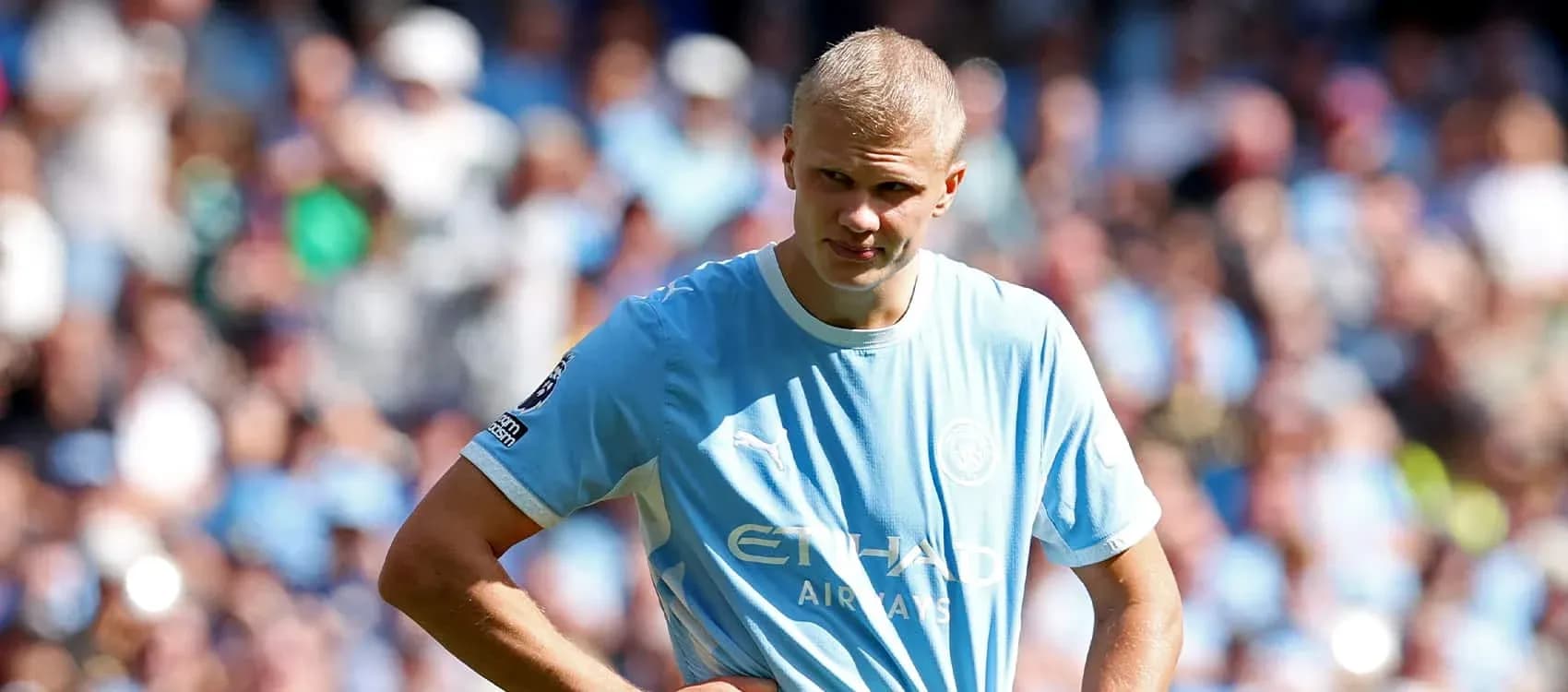Player in light blue jersey during match