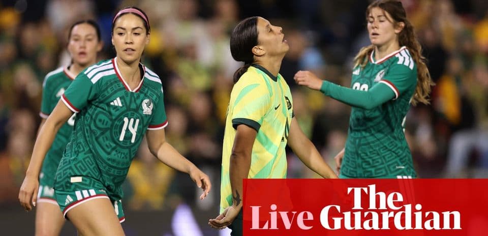 Players from Mexico and Australia during a soccer match