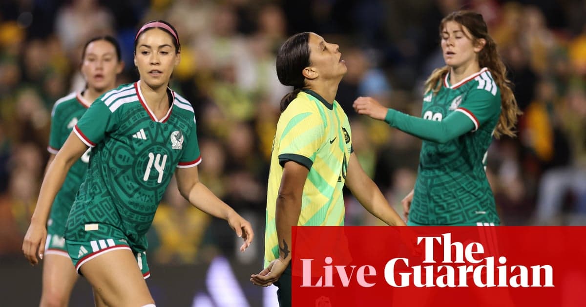 Players from Mexico and Australia during a soccer match
