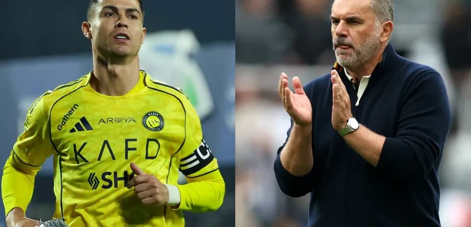 Cristiano Ronaldo and coach clapping during match