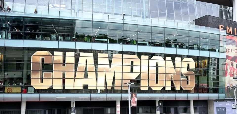Champions sign on exterior of Emirates Stadium