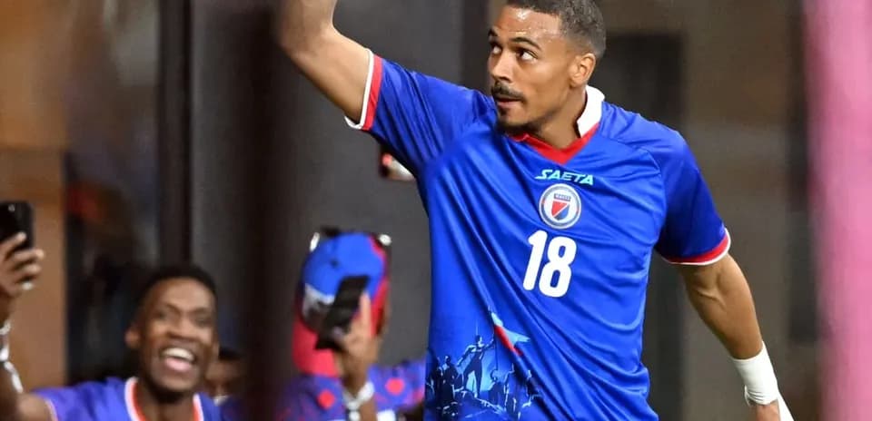 Haitian player celebrating during World Cup qualifier