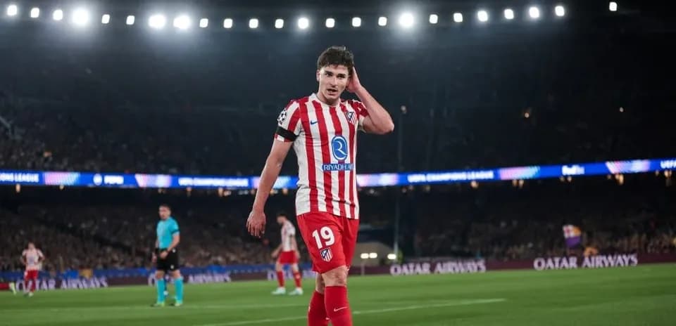 Atletico Madrid player on field during UEFA match