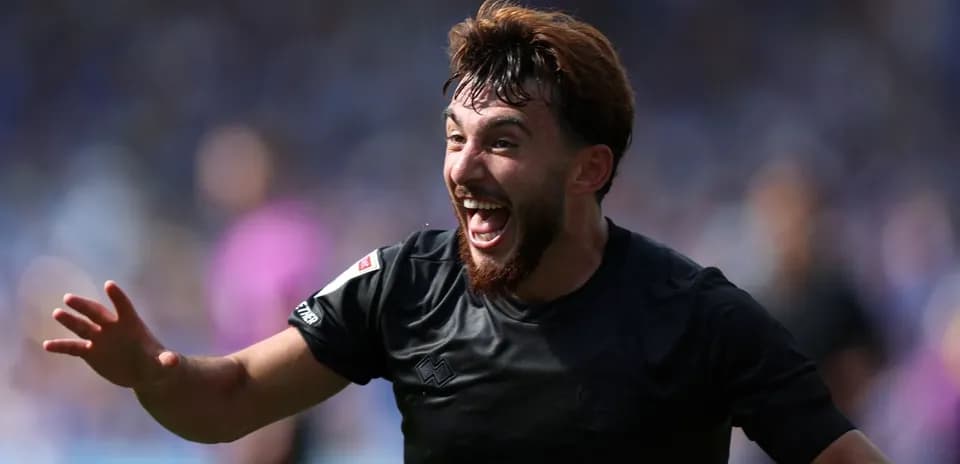 Player celebrating joyfully after scoring a goal